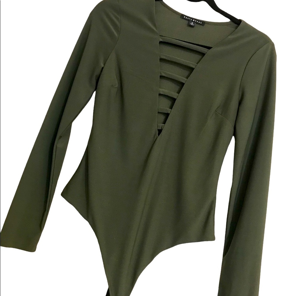Dark green bodysuit. Comfortable and spicy.